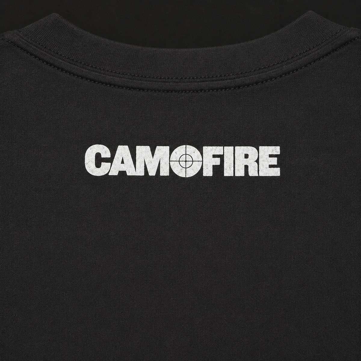 Close-up of a black crewneck sweatshirt featuring the word 'CAMOFIRE' printed in distressed white block letters across the chest, with the 'O' replaced by a target graphic.