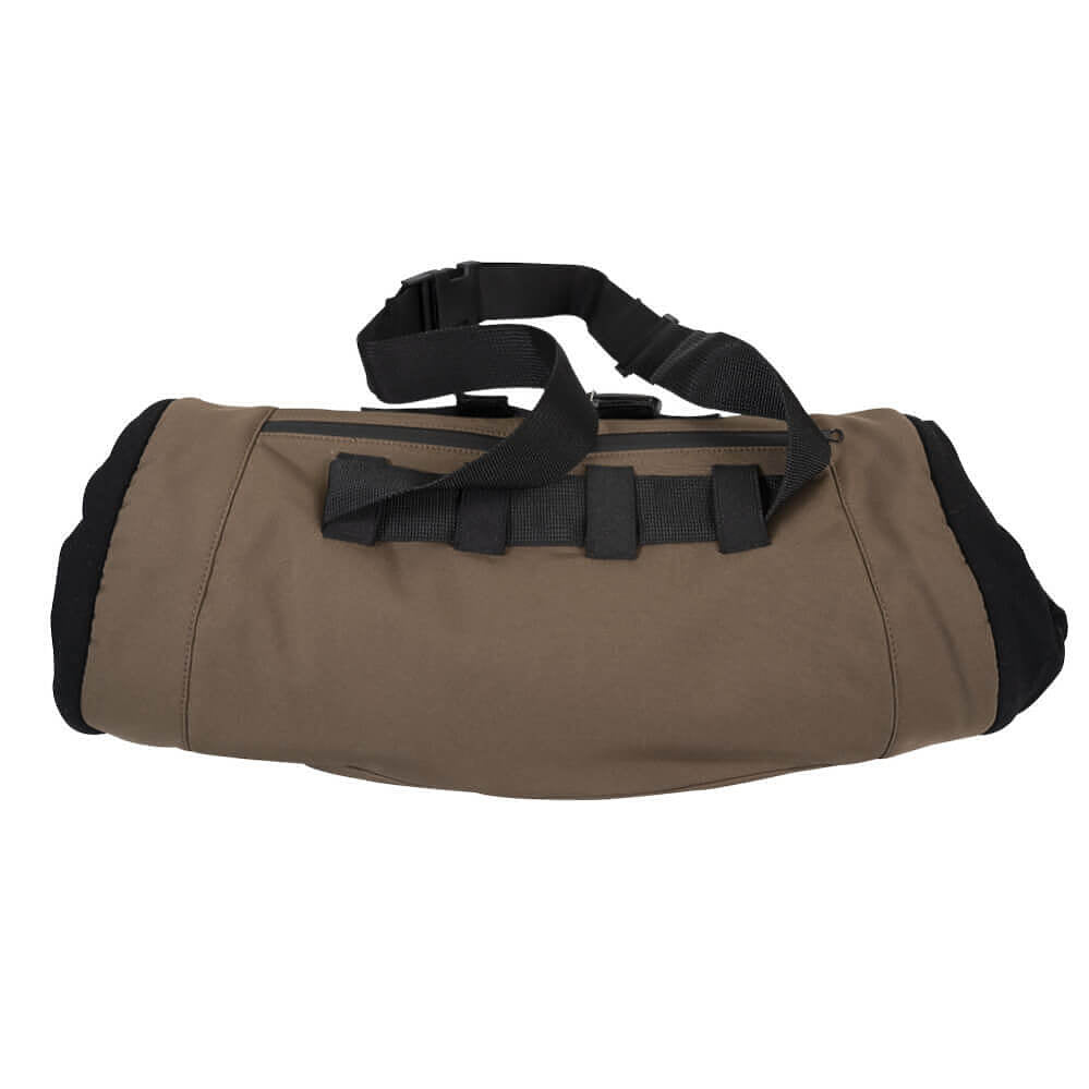 A tactical duffel bag in coyote brown with black webbing straps, zipper trim, and end caps, shown against a plain white background.