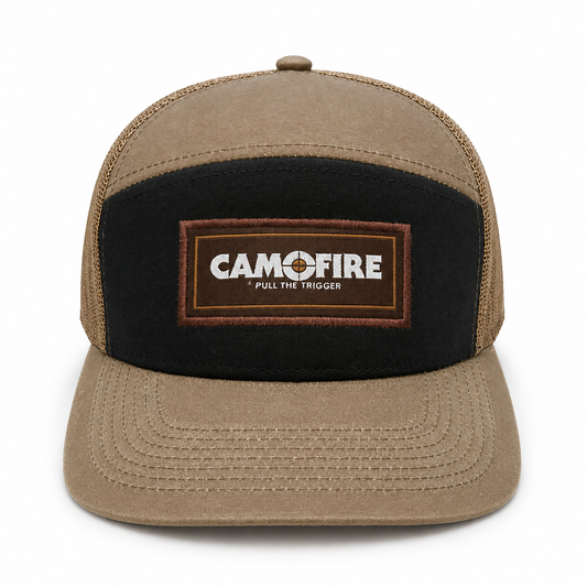 A tan and black trucker-style cap with a black front panel and a brown embroidered patch that reads 'CAMOFIRE PULL THE TRIGGER'.