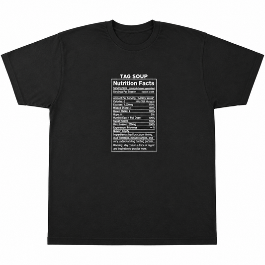 A black short-sleeve crewneck t-shirt with a white printed graphic on the chest that mimics a nutrition facts label under the text 'TAG SOUP'.