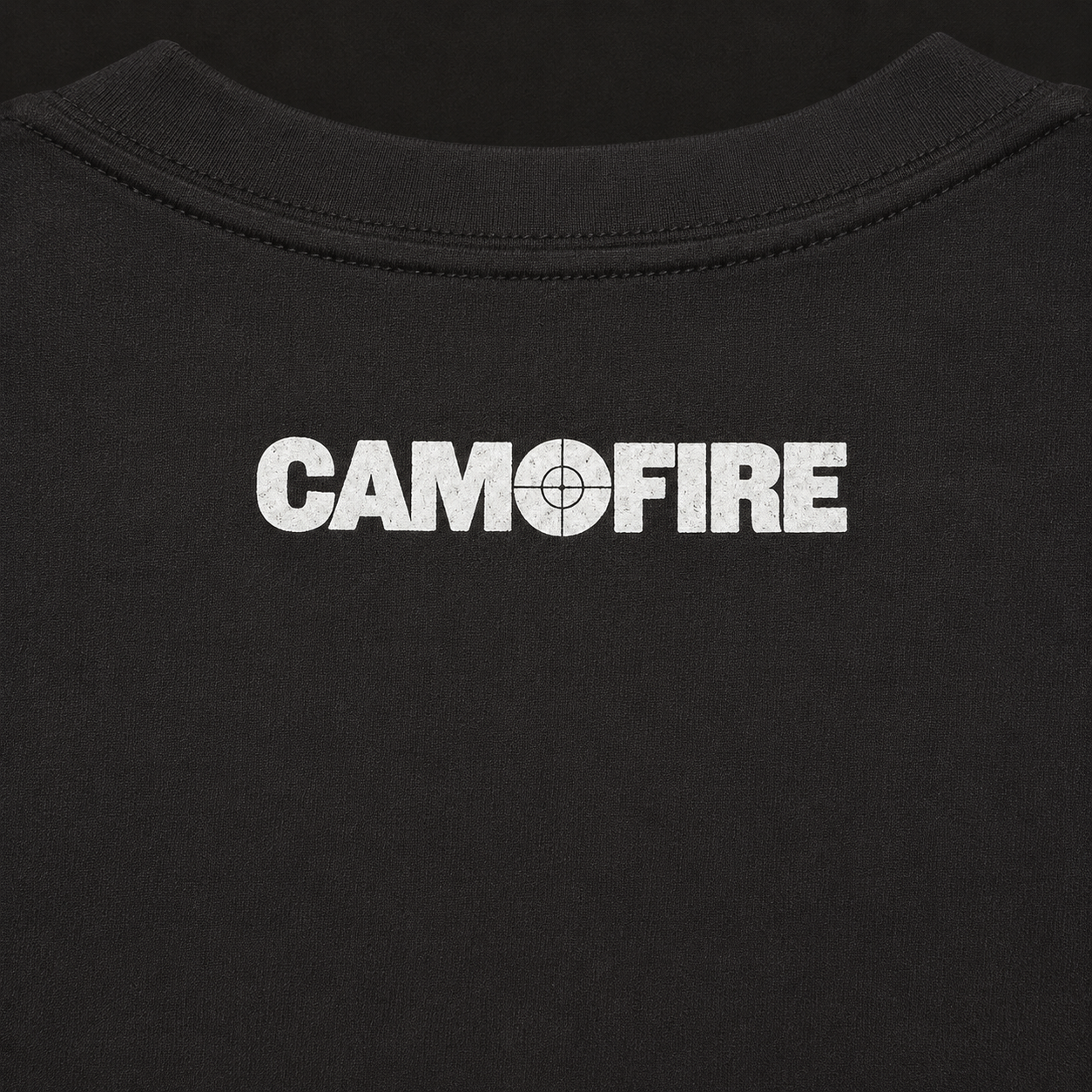 Close-up of a black crewneck sweatshirt featuring the word 'CAMOFIRE' printed in distressed white block letters across the chest, with the 'O' replaced by a target graphic.