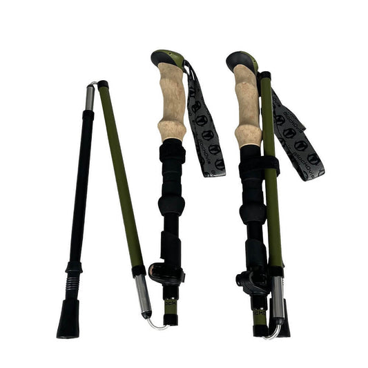 Four folding hiking poles arranged on a plain white background, showing both assembled and collapsed views. The poles are olive green with black sections, silver metal tips, and light tan wood-look handles.