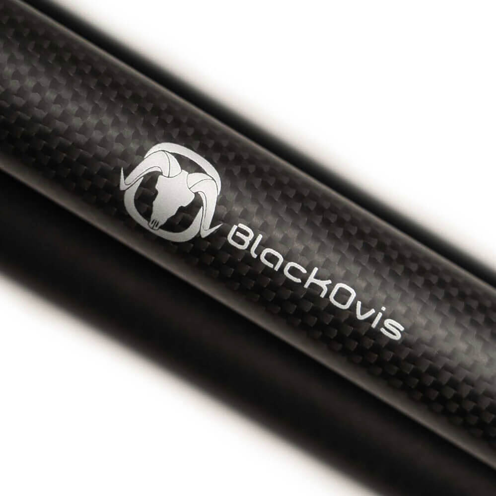 Close-up of a black carbon-fiber-textured rod or handle with a white ram-head logo and the brand name BlackOvis printed on it, against a white background.