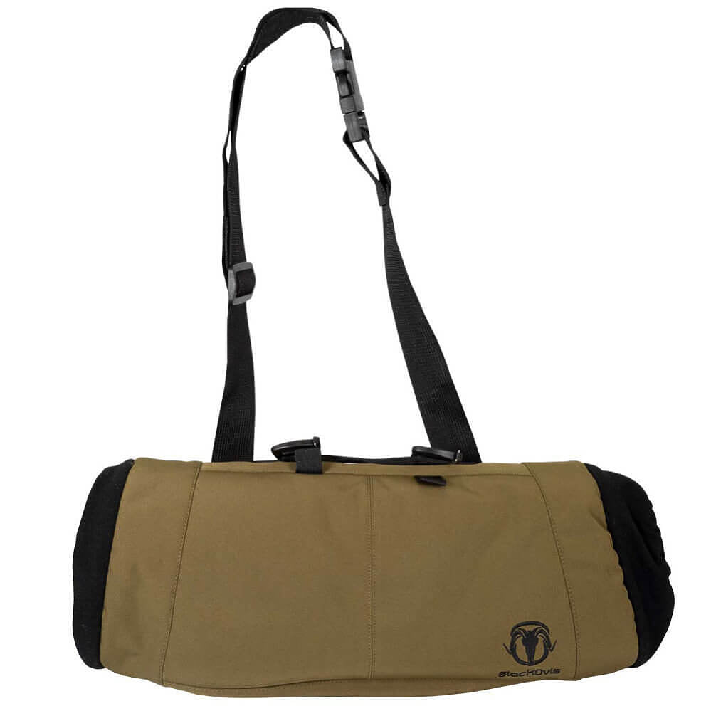 A tan and black duffel bag with a black adjustable shoulder strap, shown on a plain white background. The brand name 'Mossy Oak' is visible in the bottom right corner.