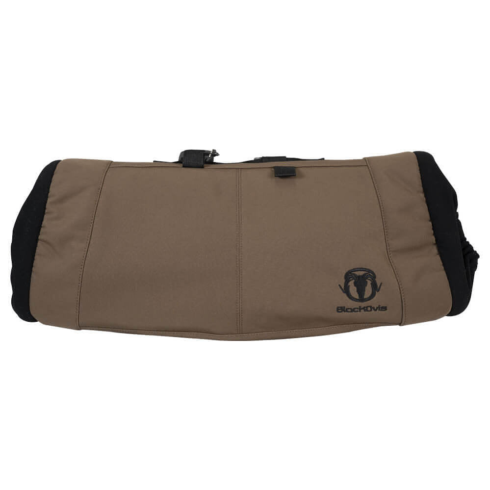 A tan and black BockD46 saddle pad shown from the side against a plain white background.