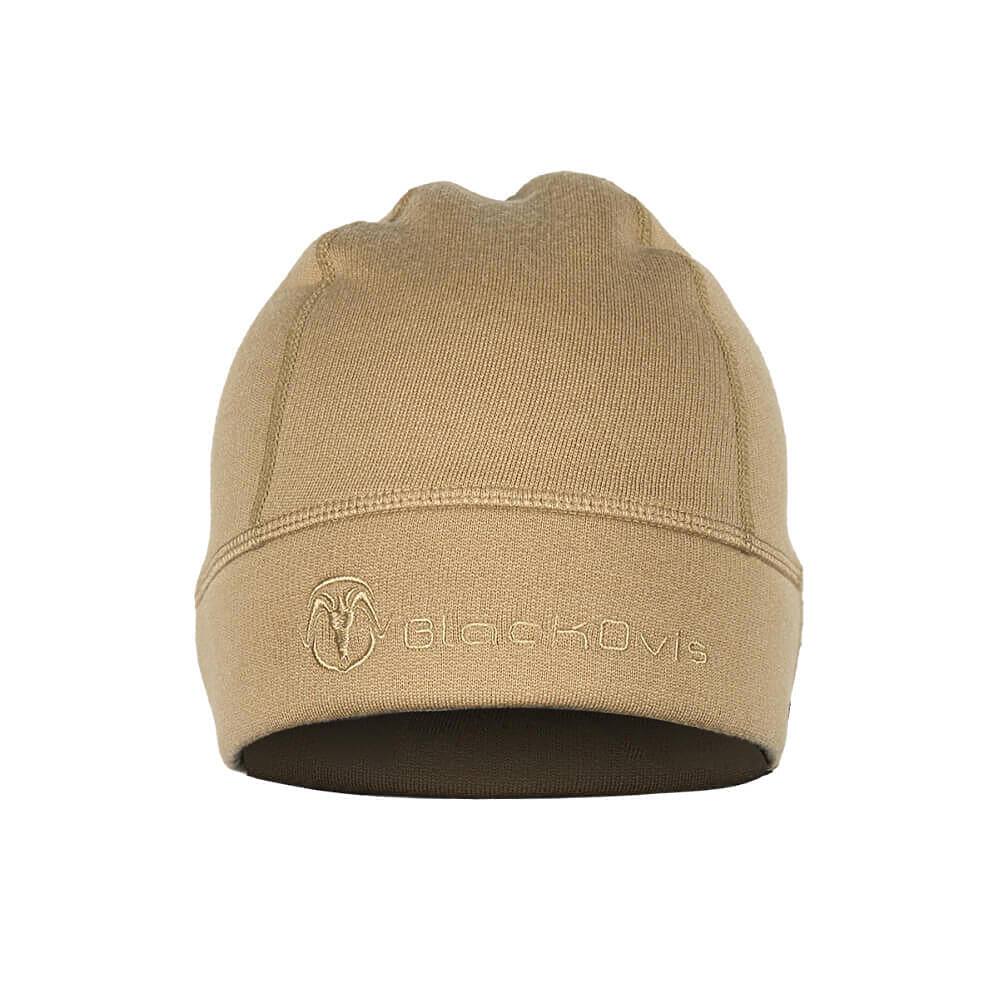 A tan knit beanie hat with a folded cuff featuring an embroidered BlackOvis ram logo and brand name, shown against a plain white background.