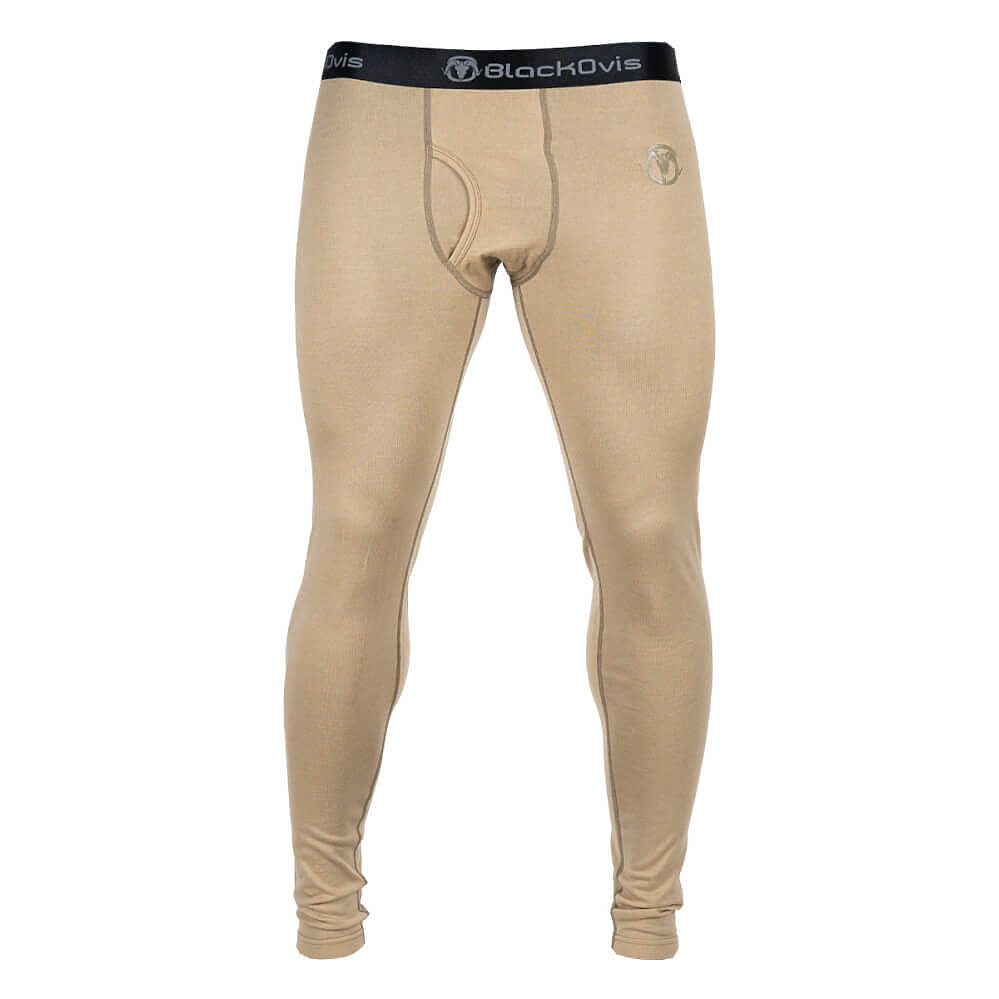 Beige full-length compression or base-layer pants shown on a headless mannequin form against a plain white background, with a black waistband featuring the blackKovis brand logo.
